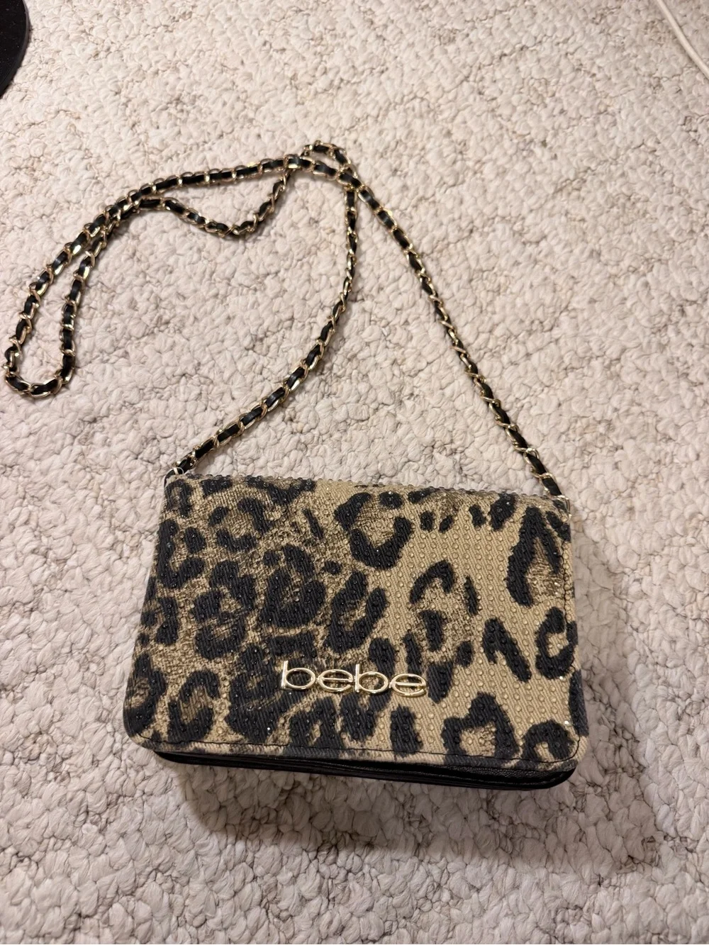 bebe Leopard-Print Crossbody in Gold and Black